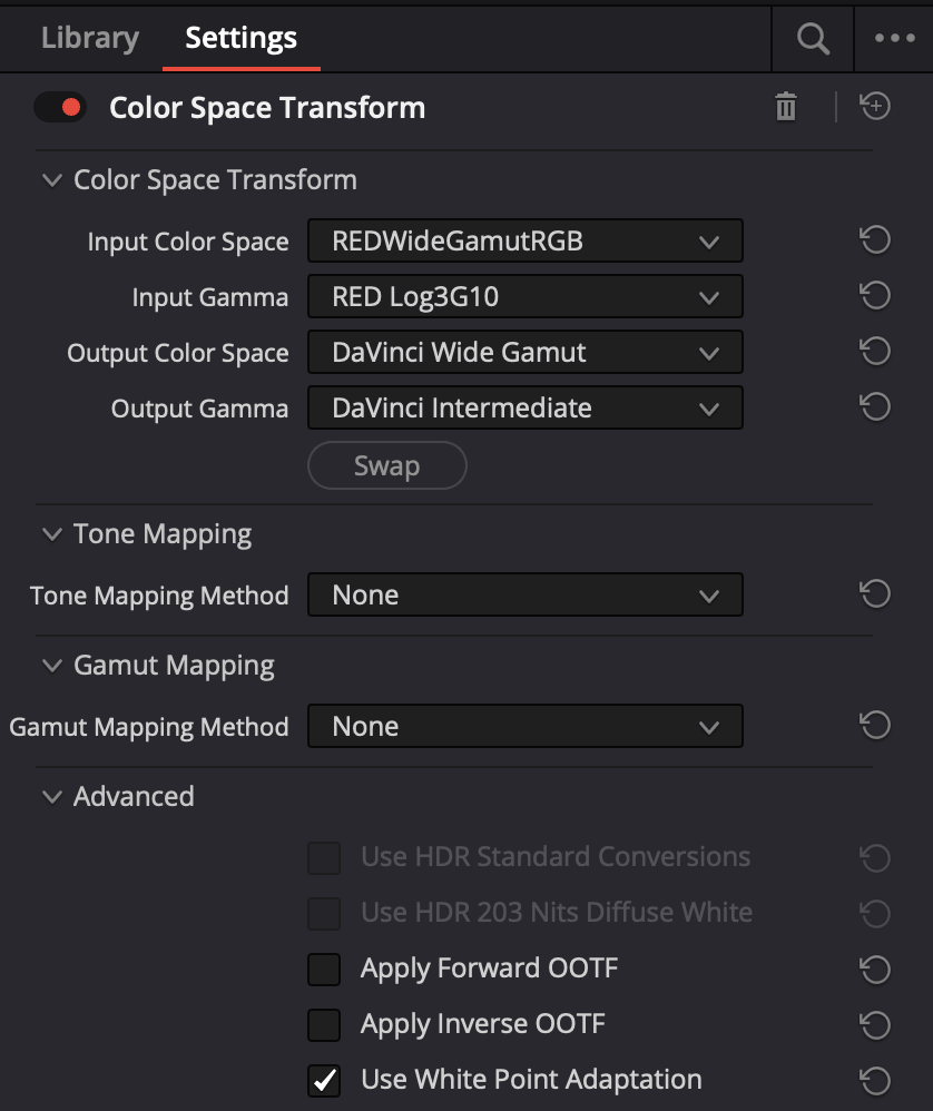 A color space transform node with input color space set to RED Wide Gamut RGB / RED Log3G10 and output set to DaVinci Wide Gamut / DaVinci Intermediate, tone mapping and gamut mapping both set to None
