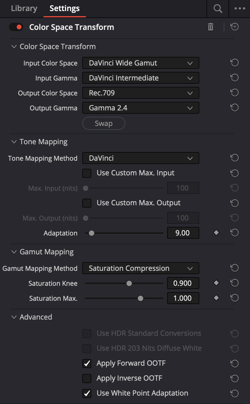 A color space transform node with input color space set to DaVinci Wide Gamut / DaVinci Intermediate and output set to Rec.709 Gamma 2.4, tone mapping method set to DaVinci and gamut mapping set to Saturation Compression